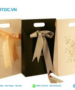 Túi giấy quà tặng được gắn nơ nắp gập nhỏ xinh