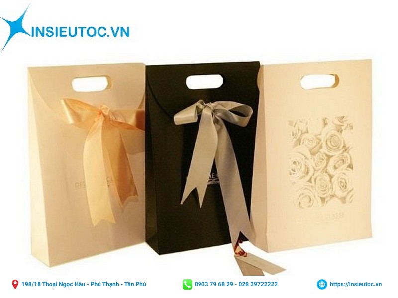 Túi giấy quà tặng được gắn nơ nắp gập nhỏ xinh