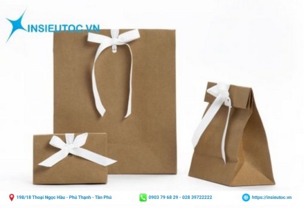 Túi giấy xi măng gắn nơ nhỏ xinh. túi giấy xi măng gắn nơ nhỏ